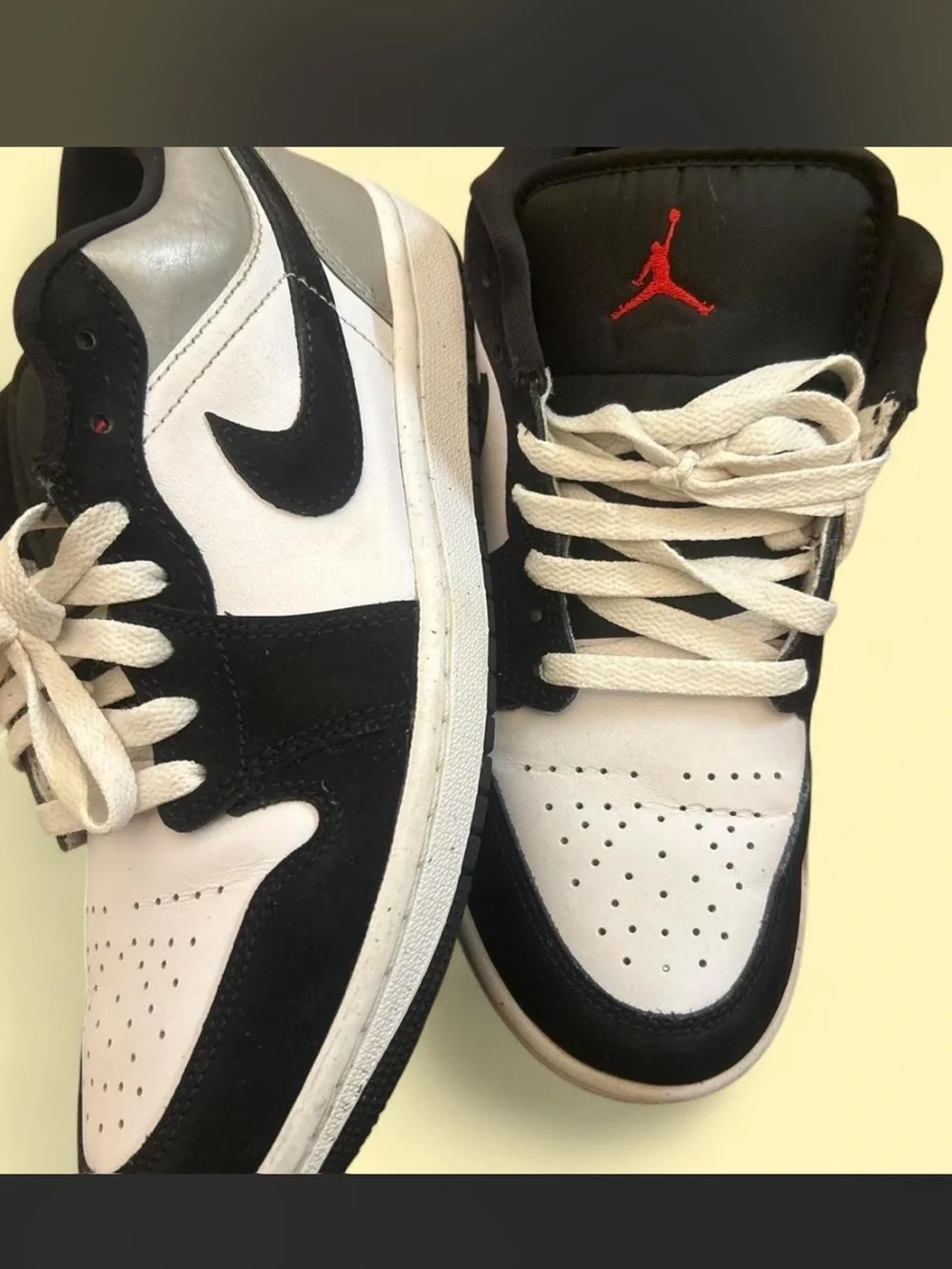 Nike Air Jordan 1 Low Black Metallic sneakers with black, white, red